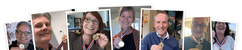 Trotse deelnemers met hun medailles