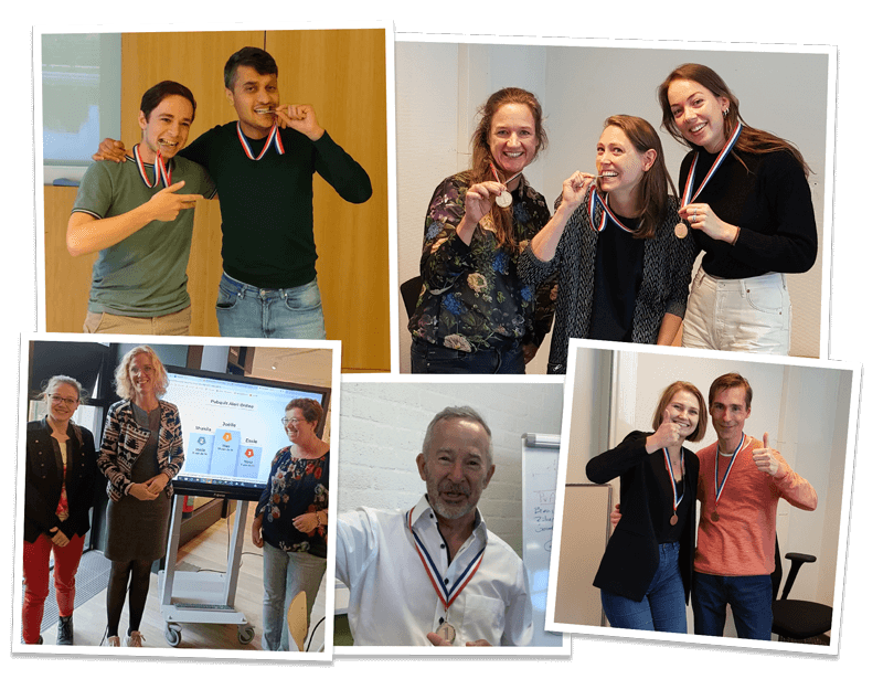 Deelnemers met medailles bij onze pub quizzen en workshops